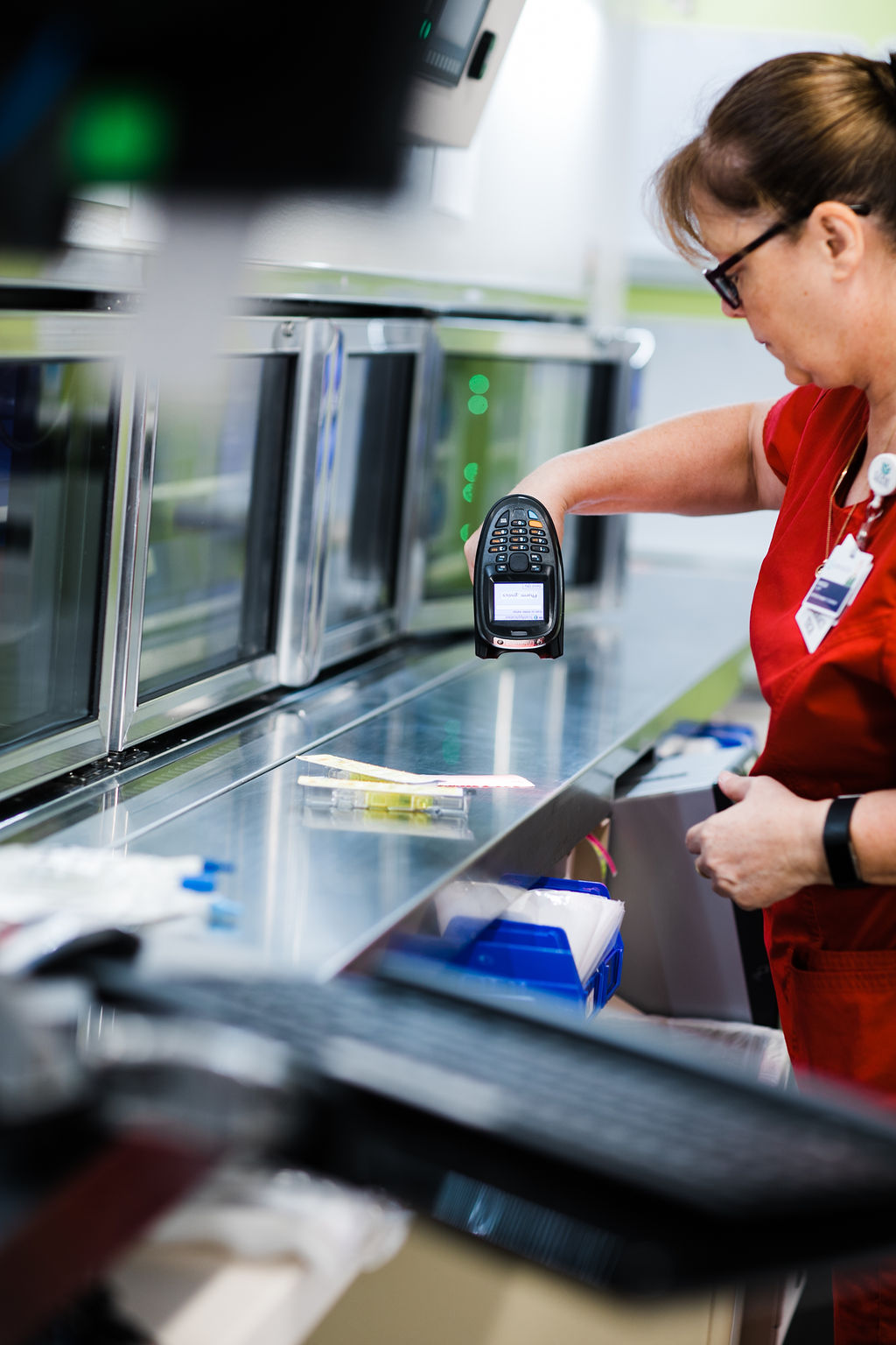 Pharmacist Using Barcode Scanning