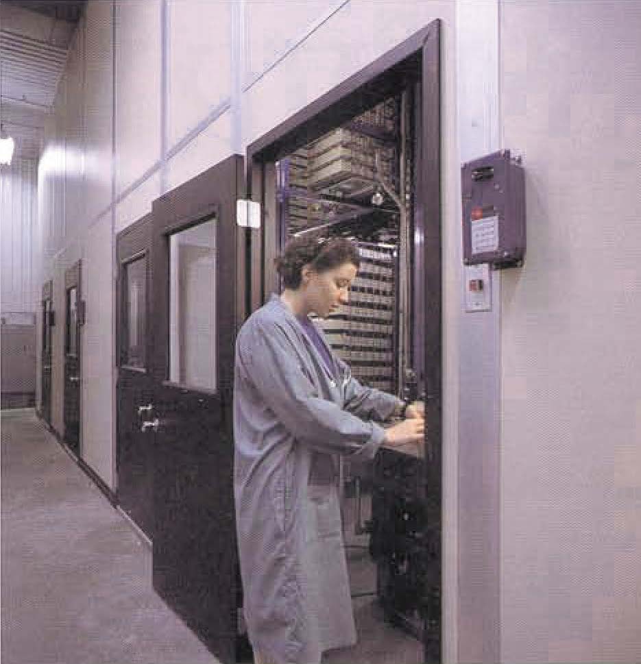 Pathology-Case_Study Woman accessing horizontal carousels in pathology case study