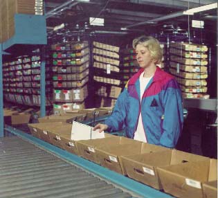 Horizontal Carousel for Seed Company Woman Uses Horizontal Carousel for Seed Company