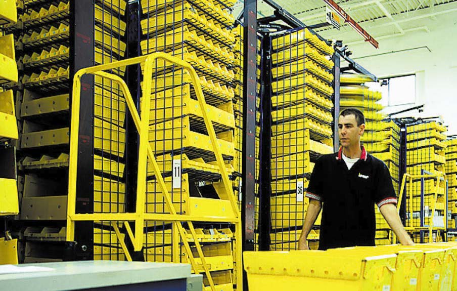 Horizontal_Carousel_Metals_Case_Study Man Operates Horizontal Carousel