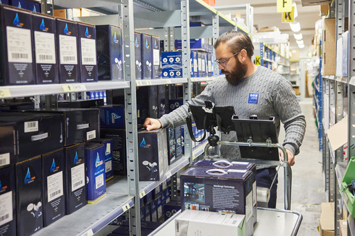 Man Accessing Storage Inventory Levels 